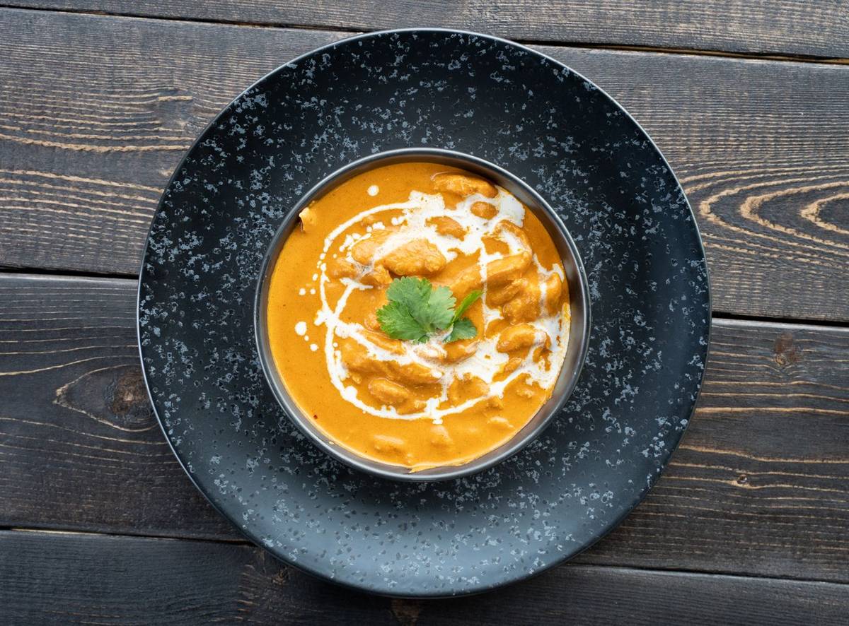 Butter chicken in a dark bowl